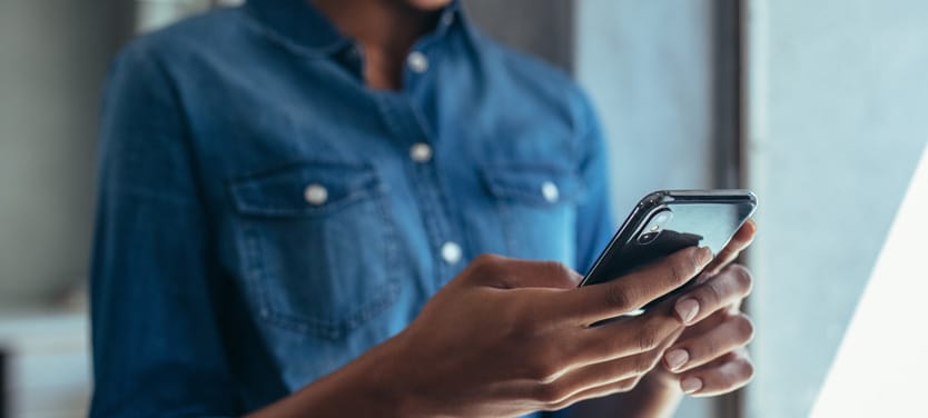 woman on mobile device
