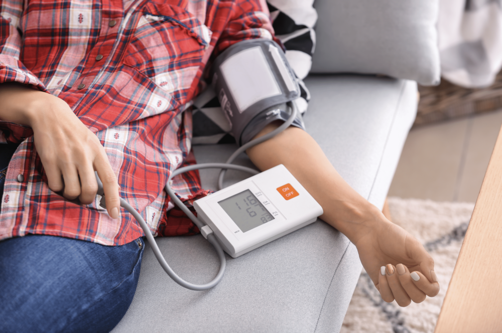 woman getting blood pressure taken