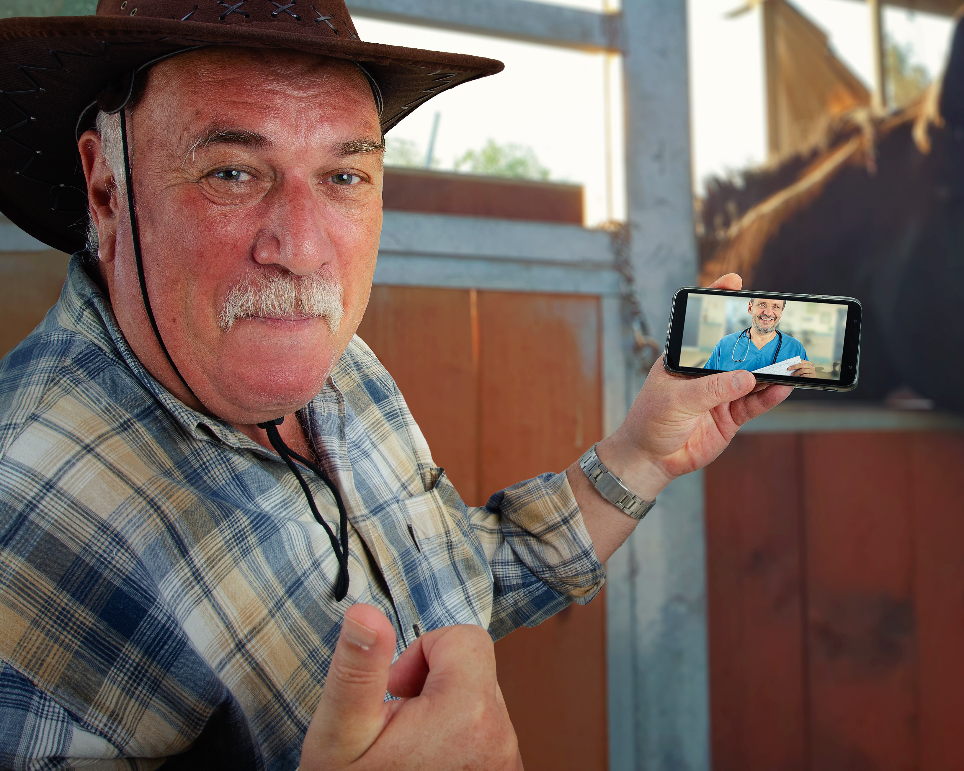 man in a video chat with his doctor via mobile device